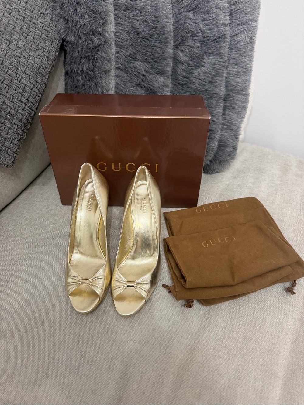 Gucci Metallic Gold Leather Peep-Toe Pumps with Knot Detail